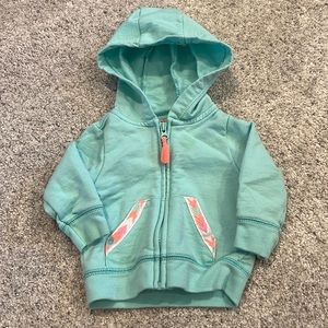 Carter’s newborn zip up hooded jacket with embroidered pocket detail and fringe